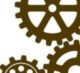 A graphic of 3 brown gears interlocked