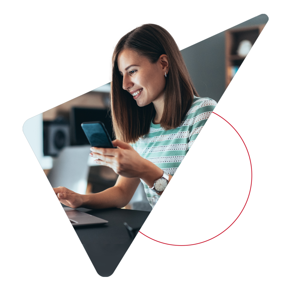 tri-external-transfers A smiling woman using both her mobile phone and laptop
