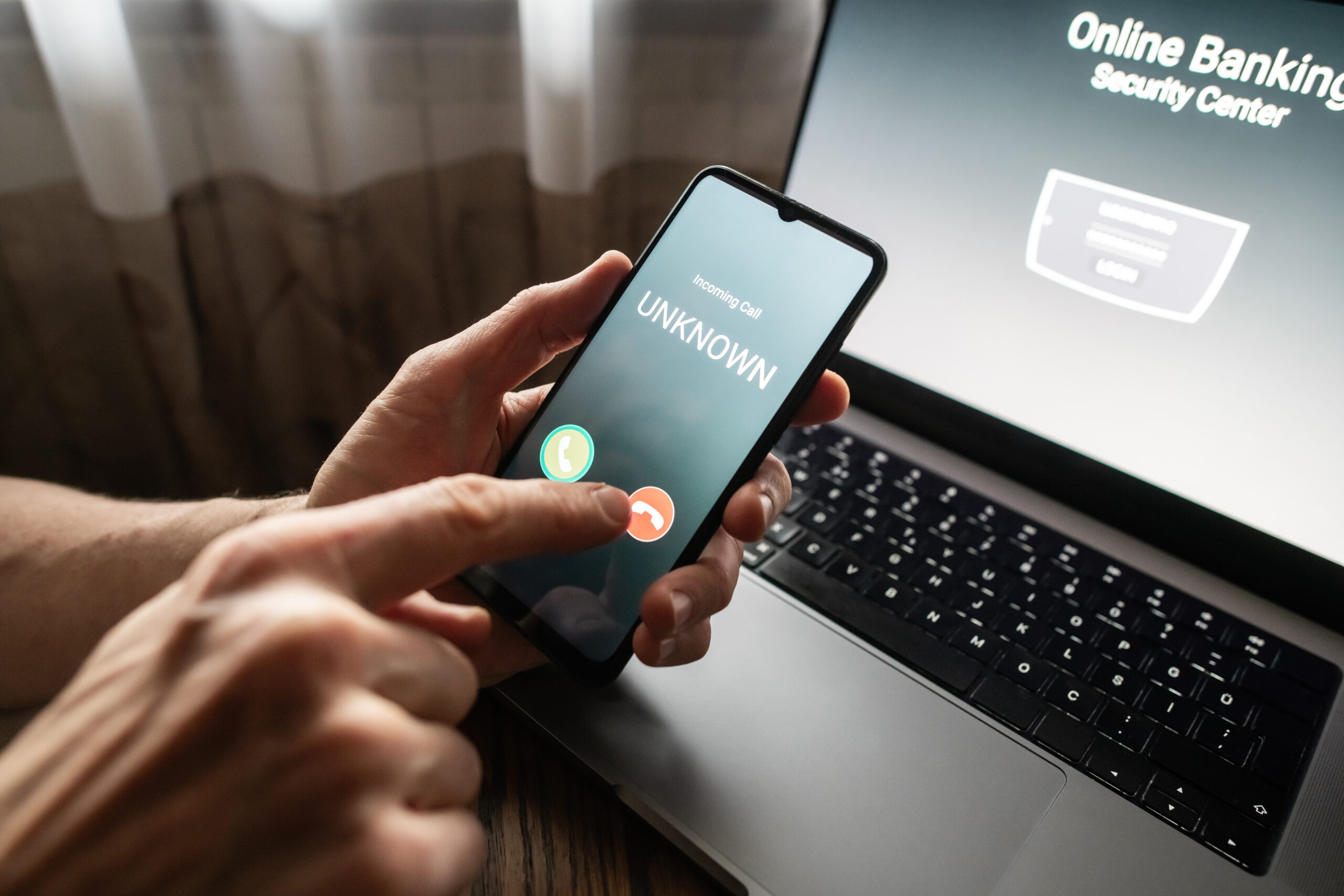 Senior man refuses to answer to a call from unknown number. Scam and fraud prevention with smartphone concept.