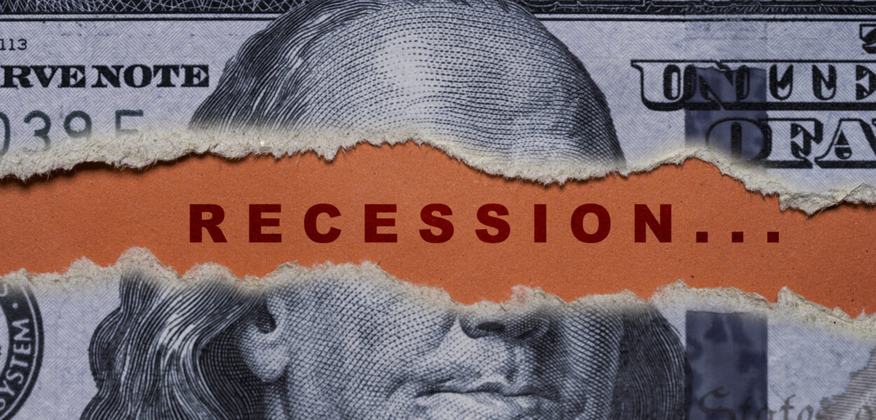 USD dollar banknote is torn with recession wording on red background for United of America risk of great economic depression crisis concept. USD dollar banknote is torn with recession wording on red background for United of America risk of great economic depression crisis concept.