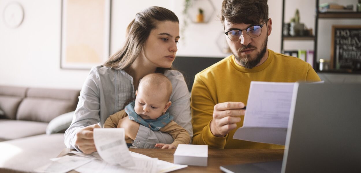 GettyImages-1434444157 resized Young family with baby worried about family budget
